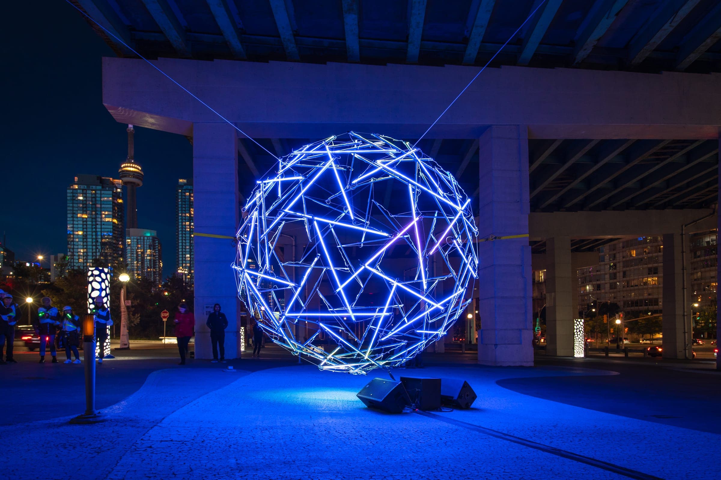 Light sphere, night crowd